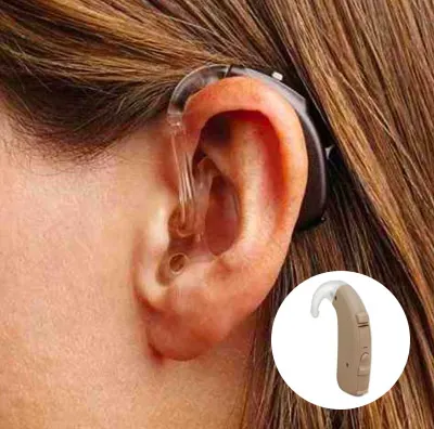 Close-up shot of a woman wearing a black behind-the-ear (BTE) hearing aid, showcasing its discreet and comfortable fit