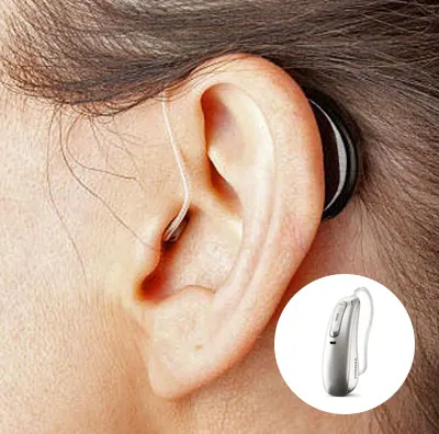 Close-up shot of a woman wearing a black receiver-in-canal (RIC) hearing aid, with only the discreet wires visible in her ear